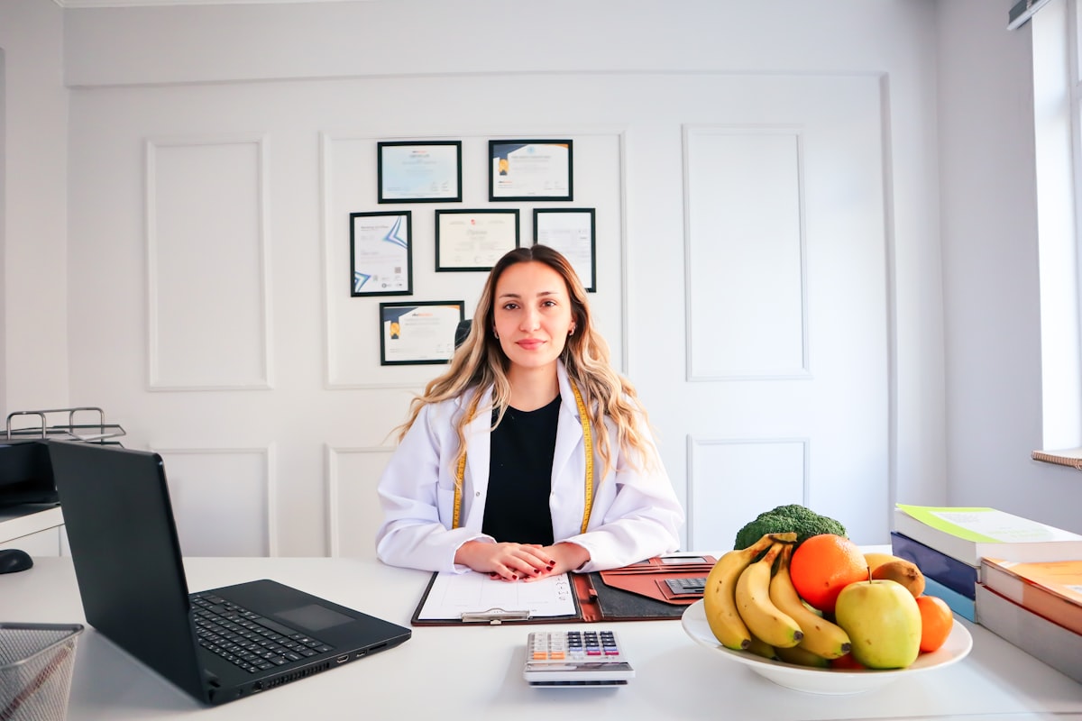 Nutritionist preparing meal plan documentation